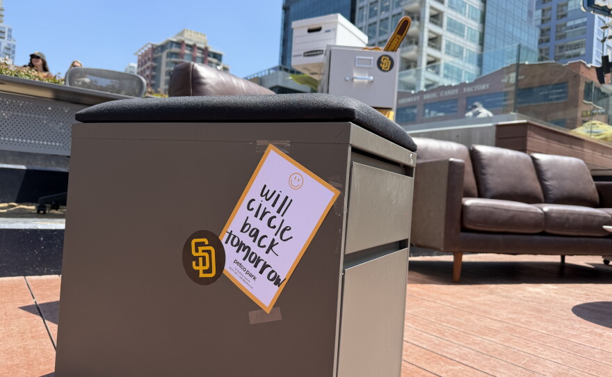 A sign at the San Diego Padres game on June 10, 2026 reads "Will circle back tomorrow." Fans were encouraged to bring their laptops and work remotely from the ballpark during the afternoon game.