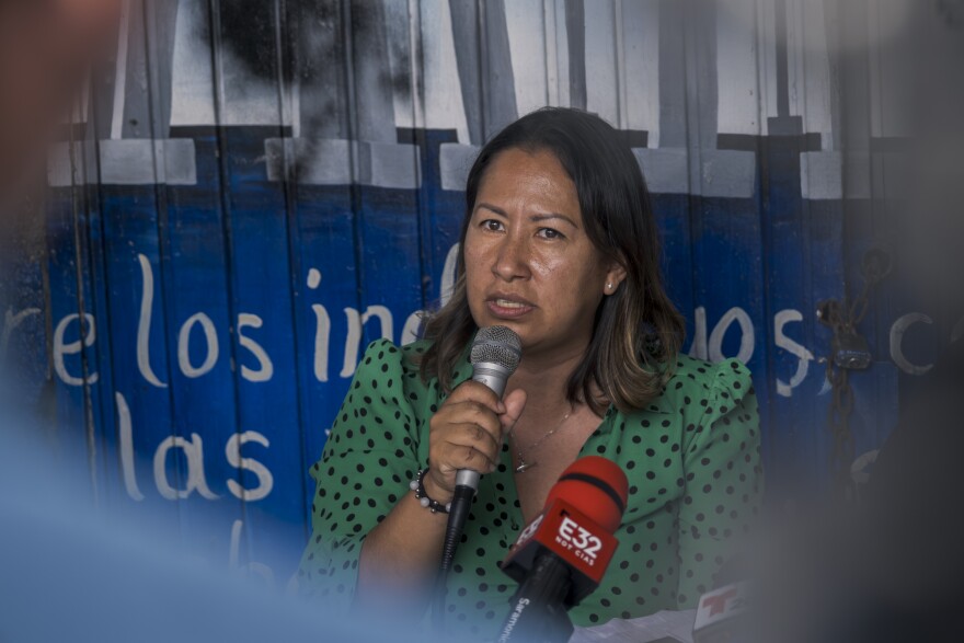 Activists from the Tijuana migrant shelter Border Line Crisis Center tell the press that Mexican National Guard members were caught by a security camera trying to force their way inside the shelter, Oct. 17, 2023.