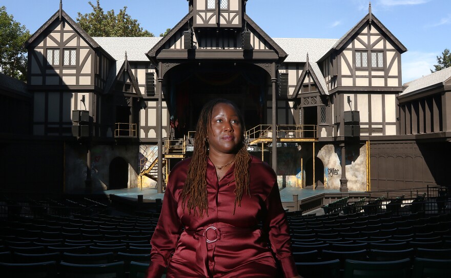Oregon Shakespeare Festival Artistic Director Nataki Garrett stands inside the Allen Elizabethan Theatre in Ashland, Ore. She recently programmed her first full season but not everyone has embraced her new approach.