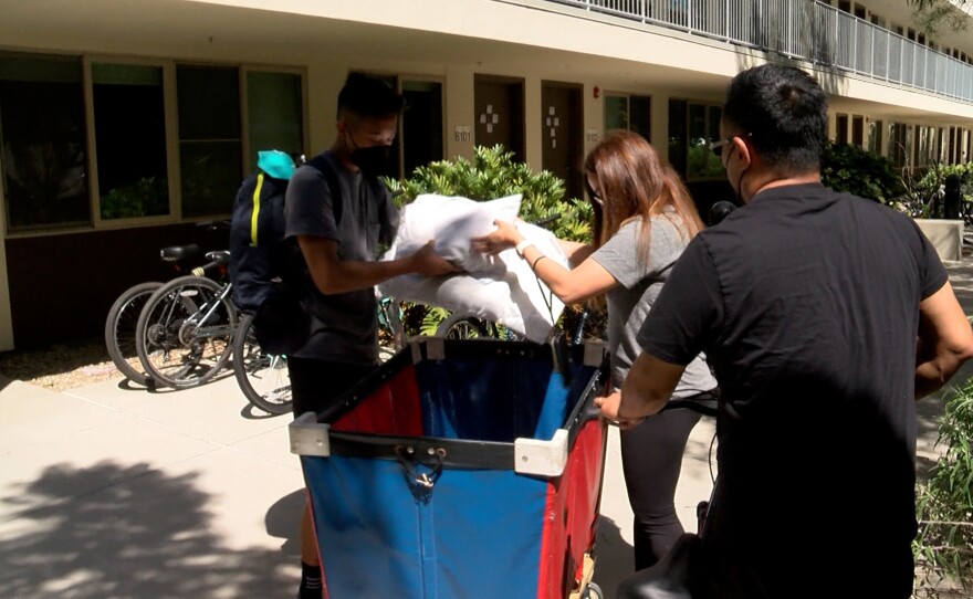 Justin Leung and his parents Wing and Monette moving into the dorms at UC San Diego in La Jolla, CA September 21, 2021