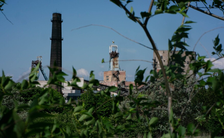 A closed coal mine in eastern Ukraine sports a Soviet star painted in Ukrainian colors. Many unprofitable mines have been shuttered or privatized.