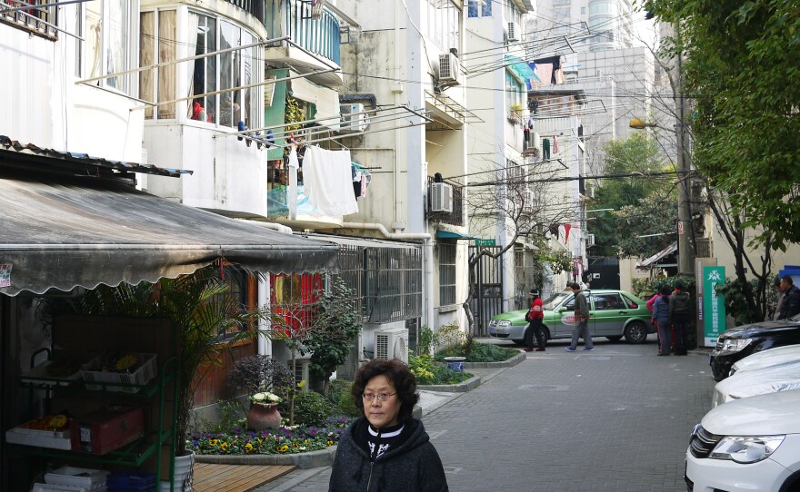 Rising Peace Lane cuts through the heart of downtown Shanghai. Typically this street is filled with activity, but during Lunar New Year, residents return to their hometowns to visit family.
