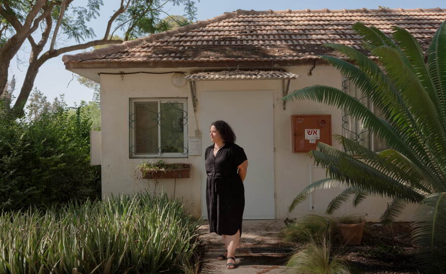 Galia Tzur, Nir Oz's recent resident from New Zealand, stands outside her office in the center of the Kibuttz Nir Oz, Israel  Aug. 31, 2026.