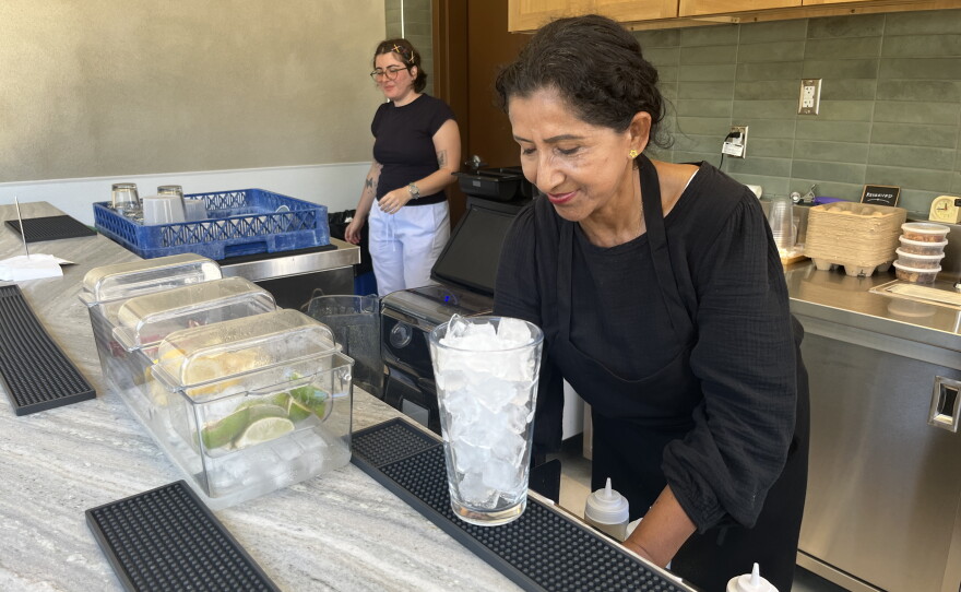 Maria Castillo prepares beverages at Make Cafe, Aug. 21, 2026.