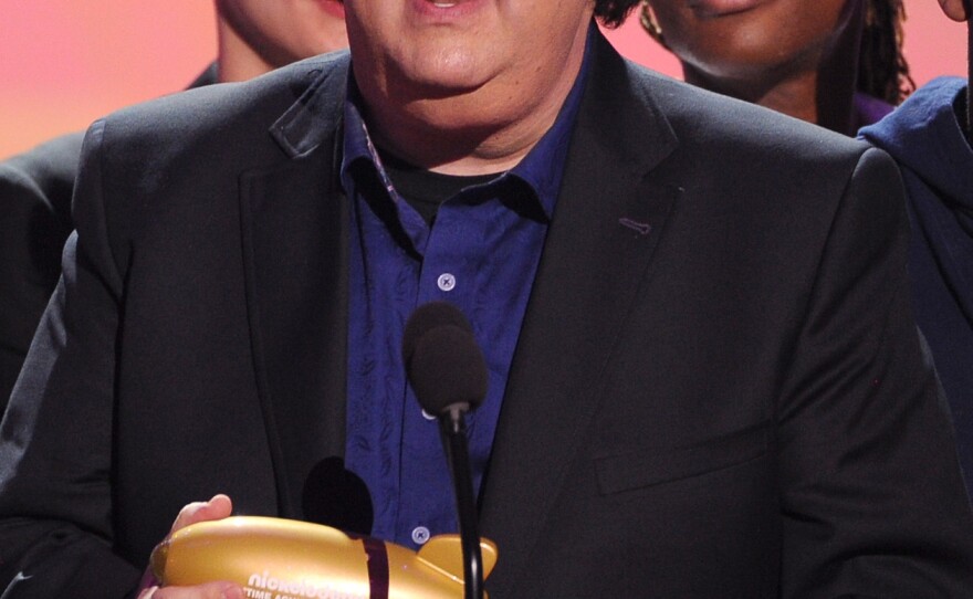 Writer/producer Dan Schneider accepts the Lifetime Achievement Award during Nickelodeon's 27th Annual Kids' Choice Awards in 2014.
