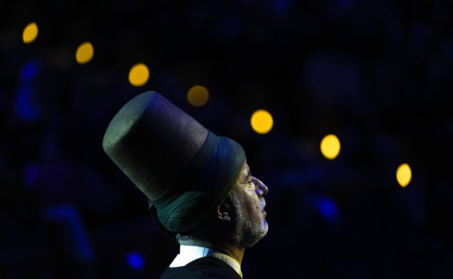 Fahri Ozcakil, sheikh of the Mevlevi order of whirling dervishes offers his prayers during the Sheb-i Arus ceremony.