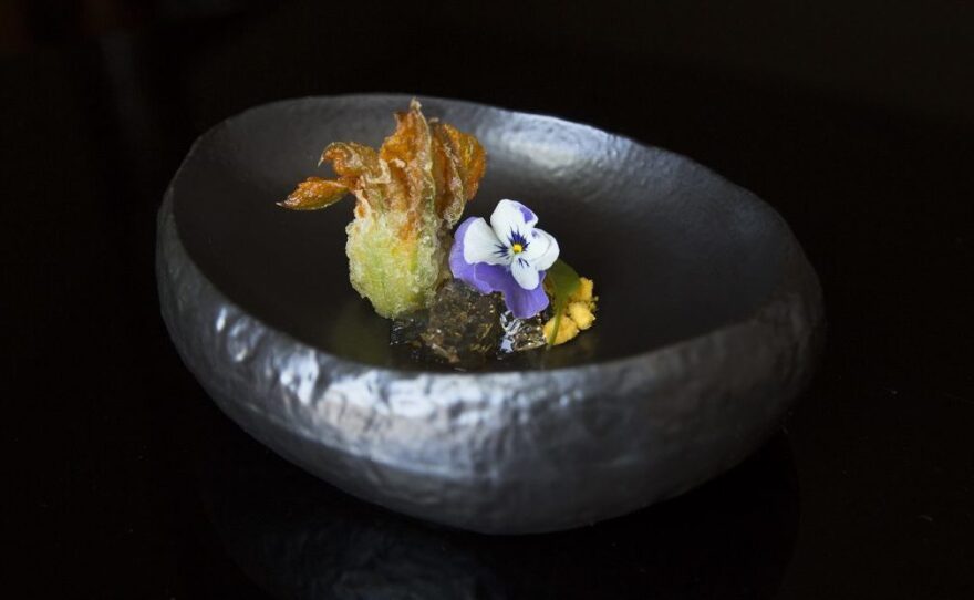 Blue crab, zucchini blossom and carrot served at N/Naka. The waiting list for Nakayama's restaurant is three months long, and it's not inexpensive. For nearly $200 each, diners can enjoy a 13-course, artfully plated culinary experience.