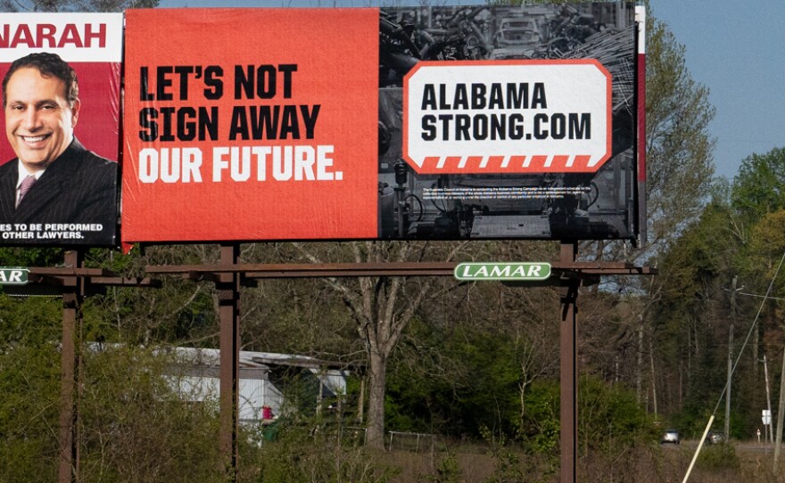 An anti-union billboard near the union hall that's served as headquarters for the organizing campaign at Mercedes-Benz.