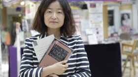 Phyllis Kim, executive director of the Korean American Forum of California, poses for a photo at the Galleria Market in Los Angeles' Koreatown, May 17, 2016. 