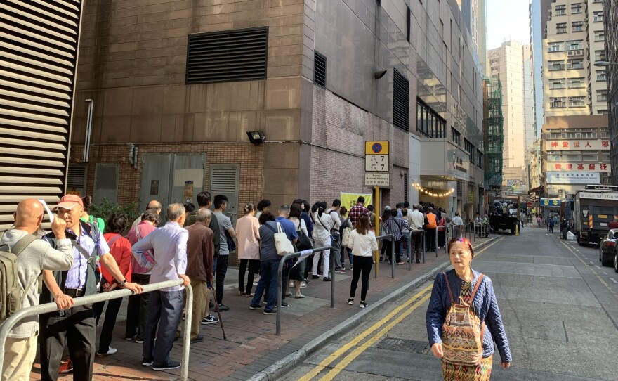 Long lines of voters waited to vote in Hong Kong's district council elections on Sunday.