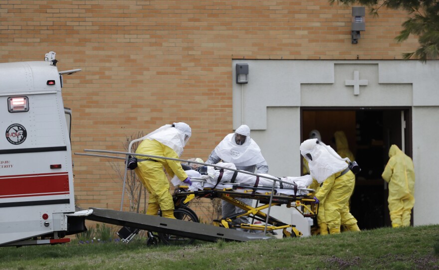 It took much of the day to load the residents of St. Joe's onto the caravan of ambulance buses. The lines of buses left all at once, with a police escort, and drove the group to CareOne at Hanover in Whippany, N.J., 45 minutes away.