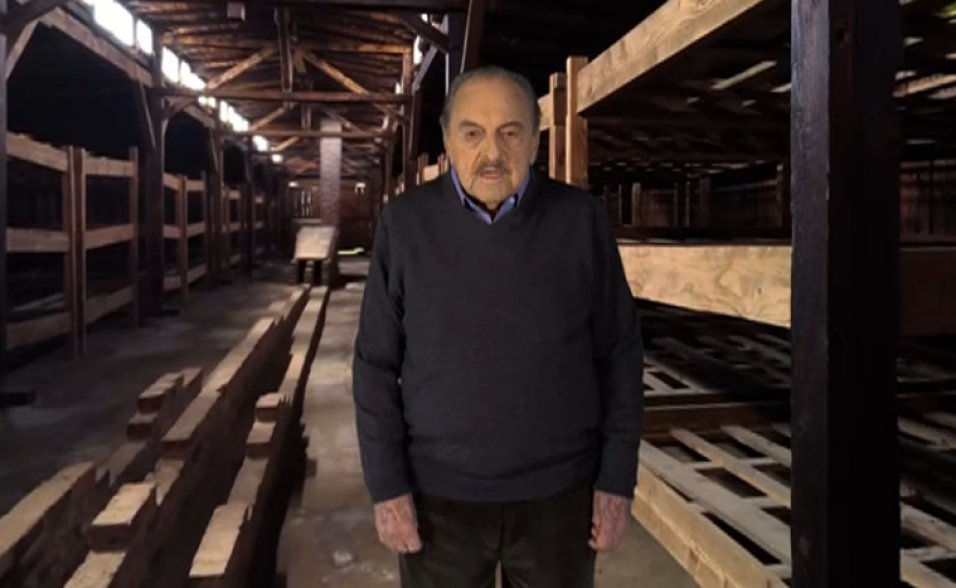 Standing in front of a green screen, survivor George Brent recounts his experience at Auschwitz-Birkenau in the VR film "Don't Forget Me."