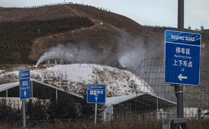 Snow machines make artificial snow near the ski jumping venue for the Beijing 2022 Winter Olympics before the area closed to visitors, on Jan. 2, in Chongli county, Zhangjiakou, Hebei province, northern China. The area will host ski and snowboard events during the Winter Olympics and Paralympics.