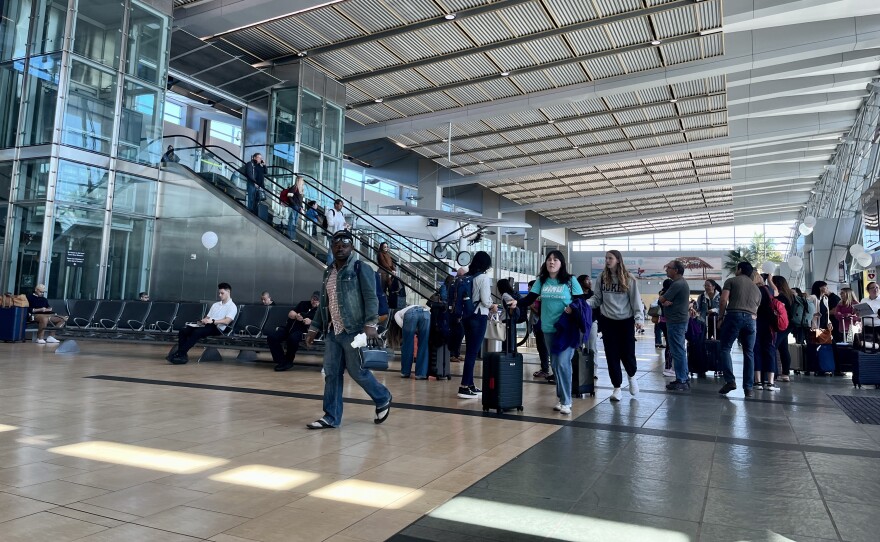 Passengers arrive at San Diego International Airport's Terminal 2, Nov. 6, 2025.
