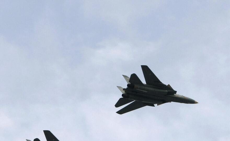 Iran's F-14 fighter jets fly during the annual army day military parade in Tehran on April 17, 2008.