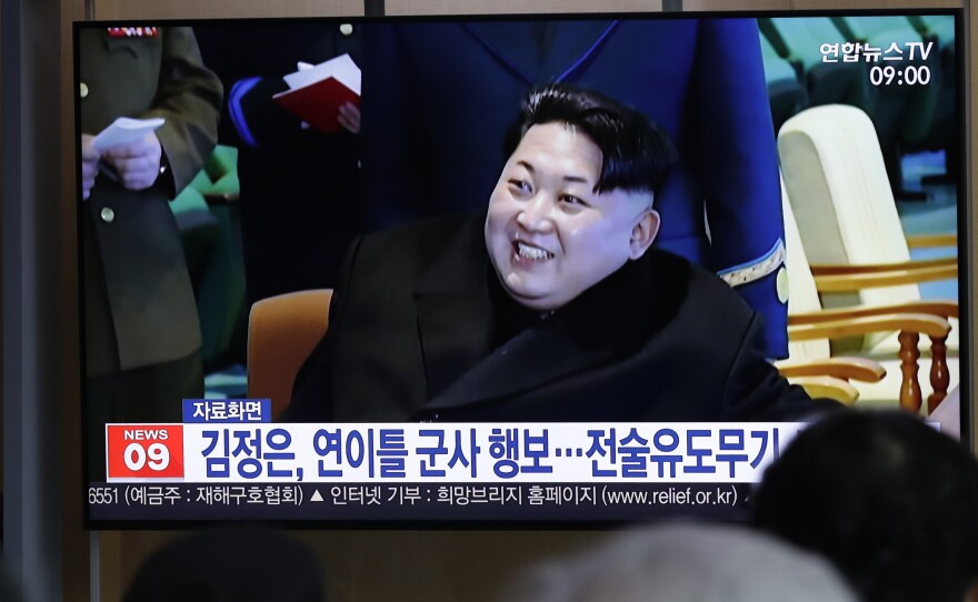 A TV report in South Korea uses file footage of North Korean leader Kim Jong Un, who supervised the test-firing of a "new-type tactical guided weapon" on Wednesday.