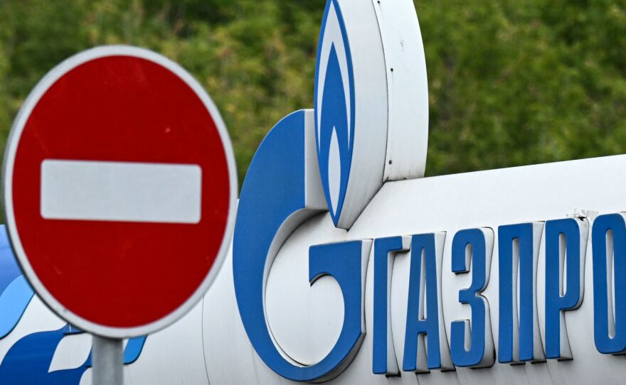 Russia reduced natural gas supplies to Europe after the West imposed sanctions, leading to higher global prices for natural gas. Here, the logo of Russia's energy giant Gazprom is displayed at a petrol station in Moscow in September.