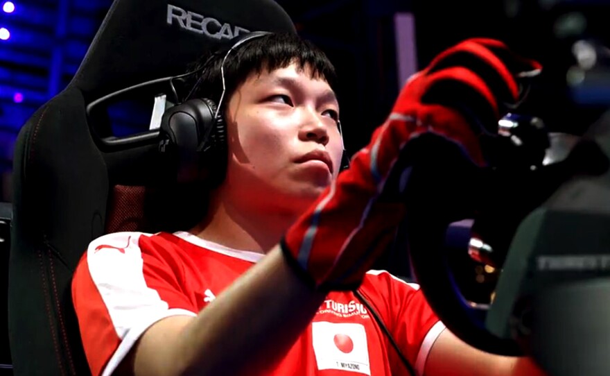 Driver Takuma Miyazono races against Gran Turismo Sophy.