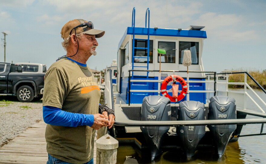 Acy Cooper is photographed at Myrtle Grove Marina during his lunch break on May 15, 2026.