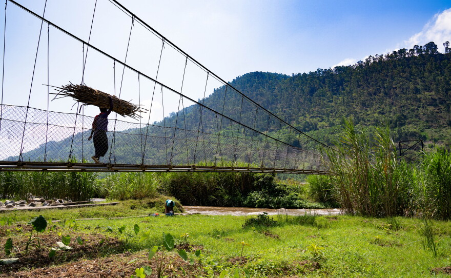 In remote parts of Rwanda, settlements on either side of a river might share services — a clinic and school on one side only, for example. A newly constructed bridge makes it easier to get to these vital services — and also allows farmers and other businesspeople to bring their goods from one community to another to sell.
