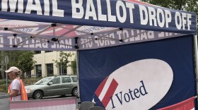 Voters drop off mail ballots at the San Diego County Registrar of Voters on Overland Avenue, June 5, 2018.