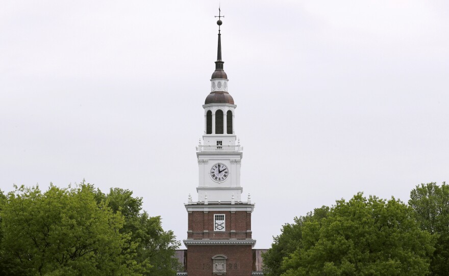 In this May 22, 2018 file photo, the spire of the Baker-Berry Library stands above The Green at Dartmouth College in Hanover, New Hampshire.