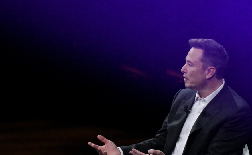 Tesla CEO Elon Musk speaks at a conference in Paris on June 16, 2023. Musk's record compensation package as Tesla CEO was recently rejected by a court as excessive, in a decision that pivoted in part on how much sway Musk has over his company.