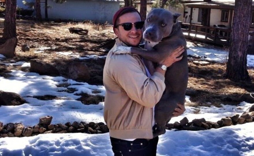 Burberry, a pit bull that was shot by a San Diego police officer, is pictured with his owner, Ian Anderson in this undated photo.