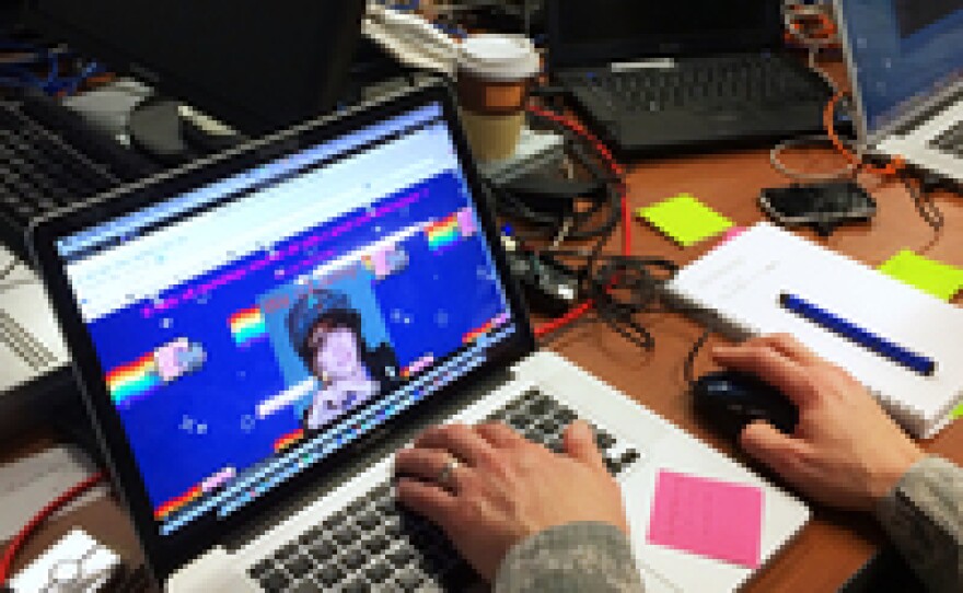 Col. Sam Kinch, of the Delaware Air National Guard, is leader of the Linux team of the NSA's red-cell. He's looking at a web page featuring a photo of Justin Bieber — confirmation that his team has successfully hacked into a U.S. Naval Academy network.