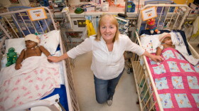 The twins in separate beds after surgery, The Royal Children's Hospital Melbourne. 