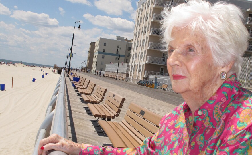 In this 2015 photograph, Lucille Horn stands on the boardwalk outside her home in Long Beach, N.Y.