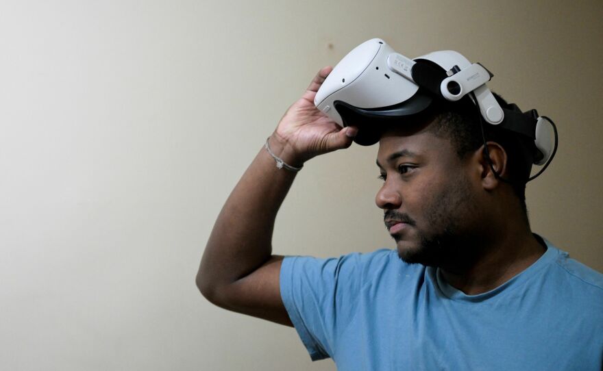 Víctor Navarro, a Venezuelan former political prisoner and developer of the "Helicoide Reality" project, shows the virtual reality tour simulating the conditions in which the prisoners live in the prison, during an interview with AFP in Buenos Aires on July 27, 2023.