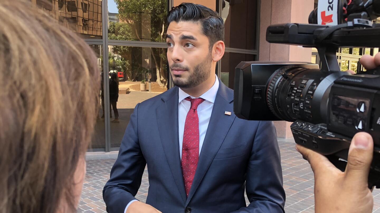 Ammar Campa-Najjar speaks with the media outside the federal courthouse downtown, August 23, 2018.