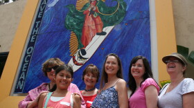 Gathered below the Surfing Madonna mosaic in Encinitas, the Snavely family celebrate a memorial brick dedicated to Allan Snavely, July 29, 2014.