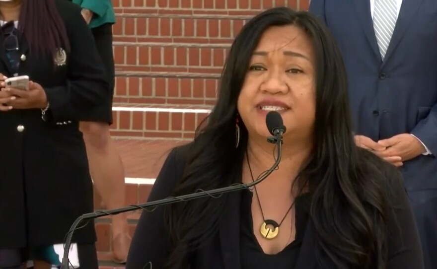 Kirin Macapugay, board member, of San Diego API Coalition, speaks at a press conference denouncing anti-Asian hate, March 24, 2021.
