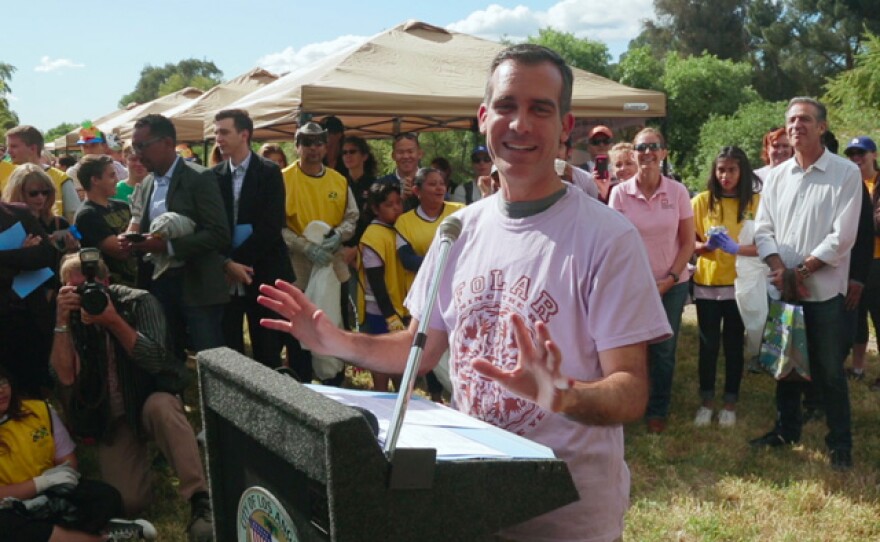 Several mayors are featured in the series, including Eric Garrett of Los Angeles, pictured here participating in an LA River clean-up event.