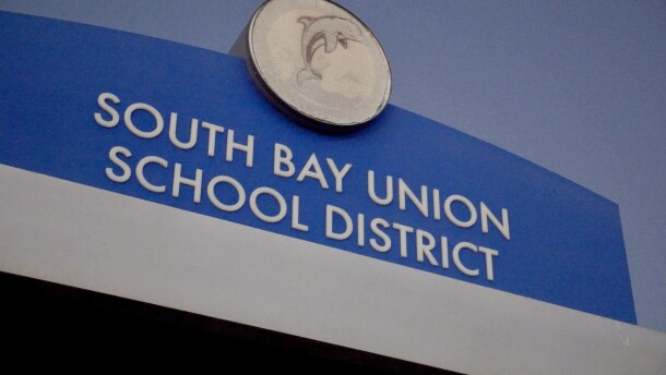 A sign for South Bay Union School District is shown at dusk, Dec. 8, 2025.