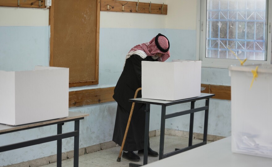A Palestinian man votes in local elections, the first in two decades in Gaza and the first in the occupied West Bank since the start of the Israel-Hamas war in Al-Ubaidiya, West Bank, Saturday, April 25, 2026.