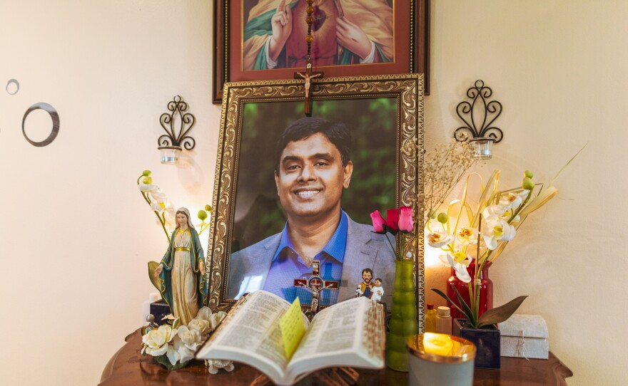 A framed photo of Elizabeth's father, George Joseph, at their in Lake Worth, Florida. George had been the central pillar in Elizabeth's tight-knit family. "He was a very outgoing person," says Elizabeth. "He was the person you rely on."