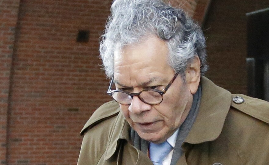 Insys Therapeutics founder John Kapoor departs federal court in Boston, Jan. 30. On Monday the company filed for Chapter 11 bankruptcy, saying it needs to sell its assets to pay back creditors. Kapoor, who was convicted last month of racketeering, owns more than 63% of the company.