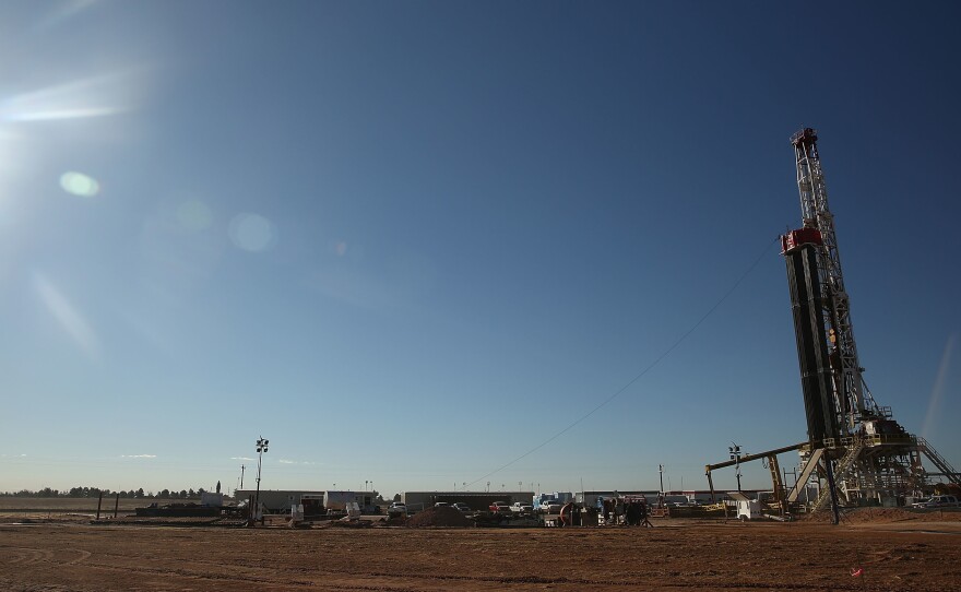 A fracking site is situated on the outskirts of town in the Permian Basin oil field in the town of Midland, Texas.