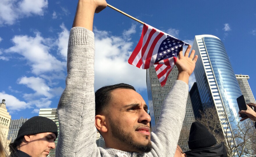 Salah Alsaidi protests at Battery Park in New York City. His mother is a green card holder from Yemen.