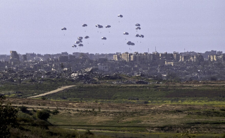 Aid parcels being airdropped over the northern Gaza Strip on March 5.