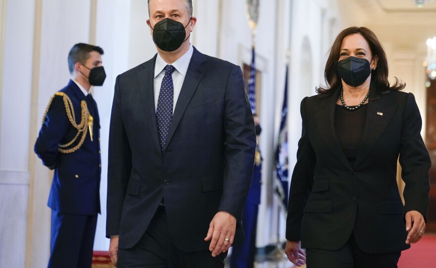 Vice President Kamala Harris and second gentleman Doug Emhoff arrive before President Joe Biden speaks at an event to celebrate Black History Month in the East Room of the White House, Monday, Feb. 28, 2022, in Washington.