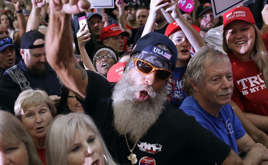 Supporters cheer for Donald Trump at a campaign rally in in Tampa, Fla., Saturday.