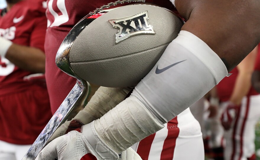 The Big 12 says its schools will start playing their conference games in late September, under a schedule that's been reduced due to the coronavirus. The conference hopes to hold a championship game in December.