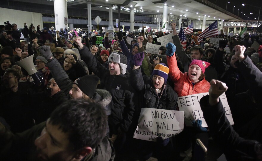 Demonstrators rallied at Chicago O'Hare International Airport.