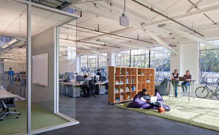 A "shared" workspace at the Atlassian office. The company installed heat and motion sensors to track when and how often every desk, room and table was used.