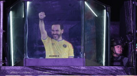 Presidential candidate Abelardo de la Espriella of the opposition Defenders of the Motherland movement speaks to supporters from inside a bulletproof booth at a celebration rally after runoff election results showed him leading in Barranquilla, Colombia, Sunday, June 21, 2026.