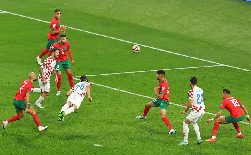 Croatia's Joško Gvardiol heads to score during the 2022 World Cup's third-place play-off match with Morocco on Saturday, Dec. 17, at Khalifa International Stadium in Doha, Qatar.